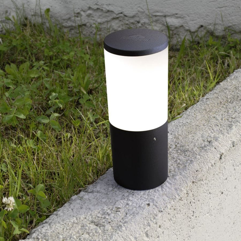 Fumagalli Amelia small bollard light on a low garden wall