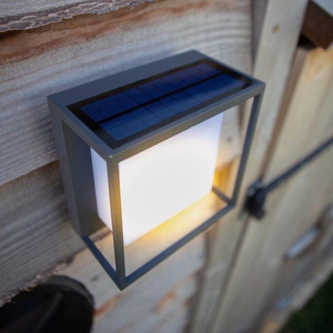 Square outdoor wall light, The Curtis from Lutec lighting, featuring a solar panel in the upper surface