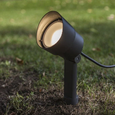 Lutec Explorer outdoor ground spot  light on spike inserted in to the lawn