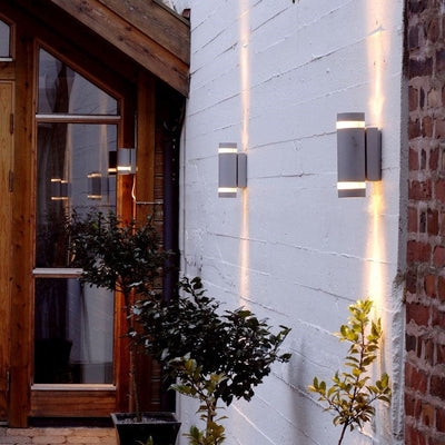 Lutec Focus Dusk to dawn Wall Light on an exterior wall